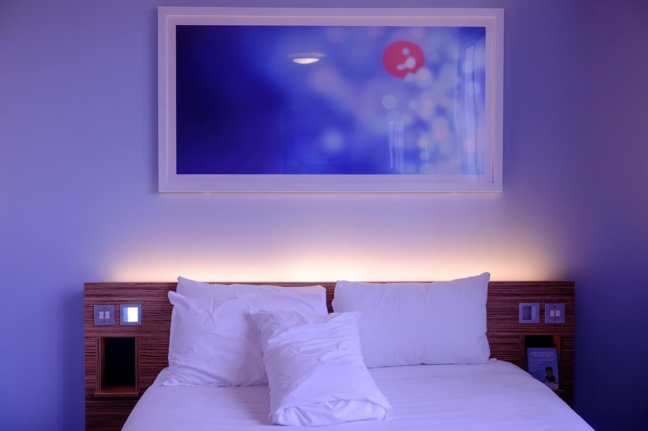 Cozy bedroom featuring creative gallery wall