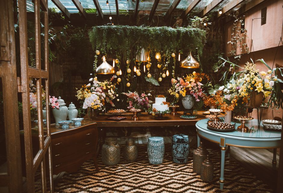 Guests enjoying futuristic garden lighting trends.