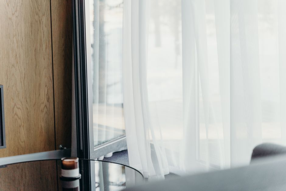 Stylish summer panels replacing traditional drapes