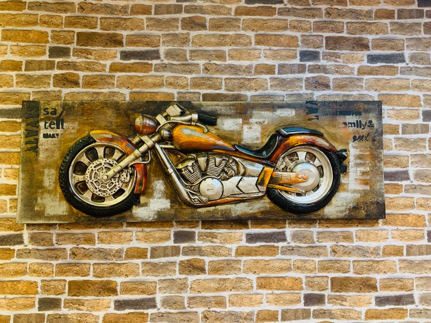 Metal poster highlighting modern artistic home.